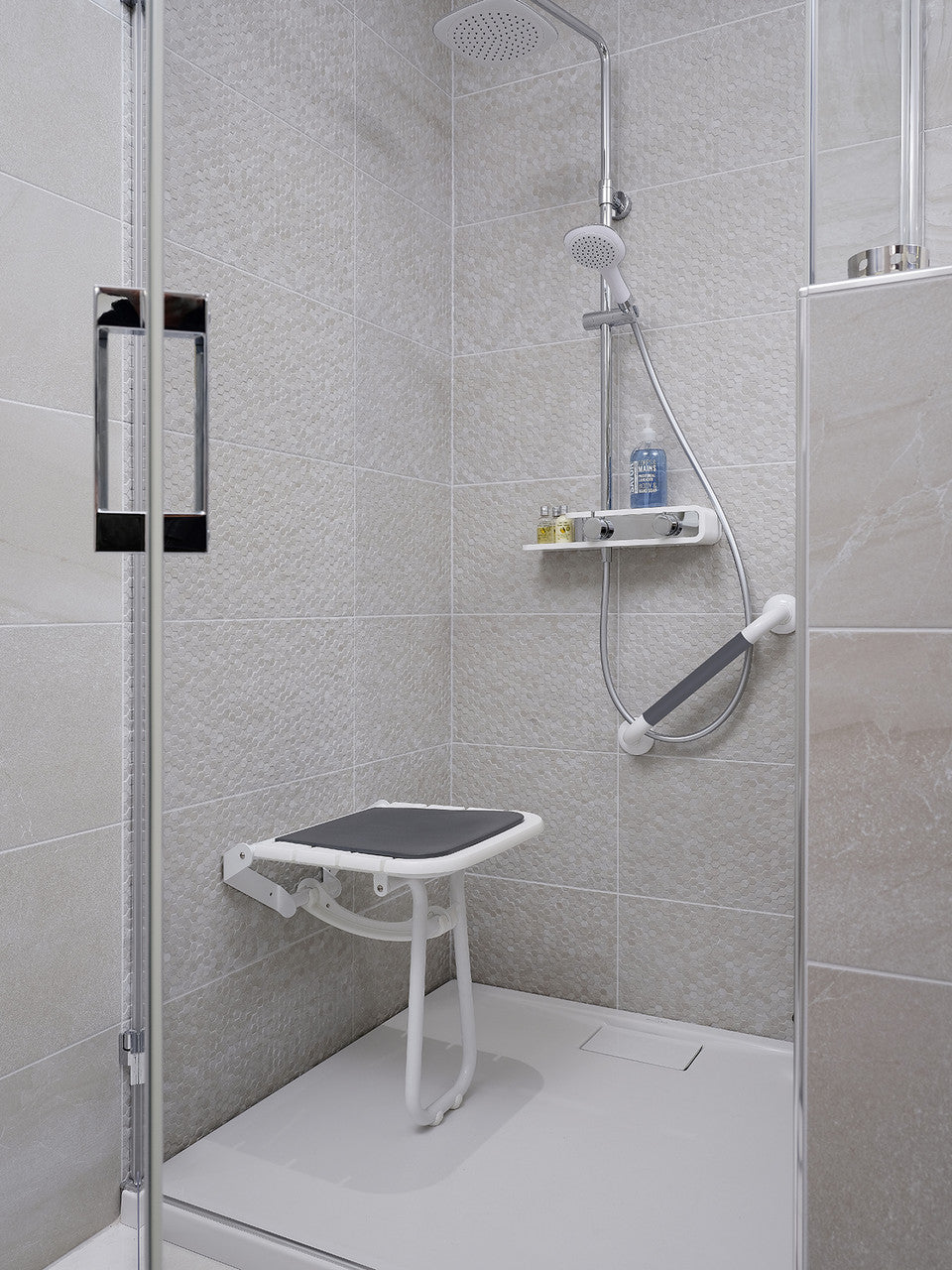 Comfortique wall mounted foldaway shower chair with back and arm rests