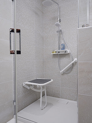 Comfortique wall mounted foldaway shower chair with back and arm rests